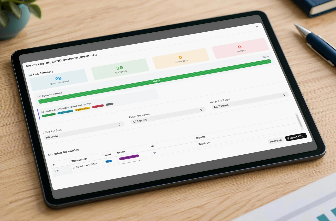 Tablet showing the QuickBooks to ERPNext import log: 29 records, 29 imported, 0 warnings, 0 errors